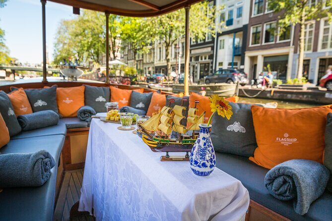 Amsterdam Canal Cruise in Classic Salon Boat With Drinks and Cheese - The Setting and Boat: Over a Century of Charm