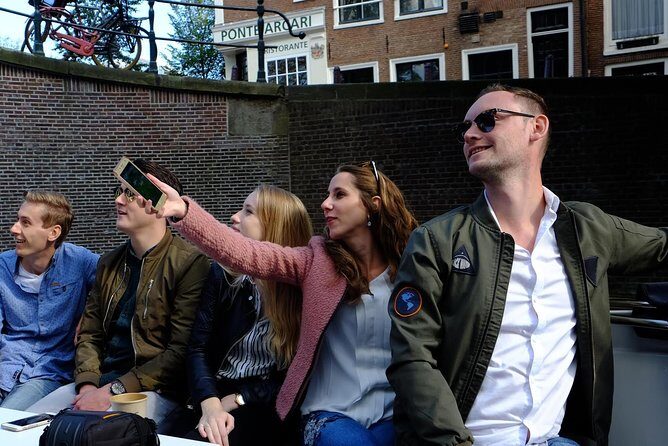 Amsterdam Small-Group Canal Cruise Including Snacks and Drinks - The Experience Itself: What to Expect