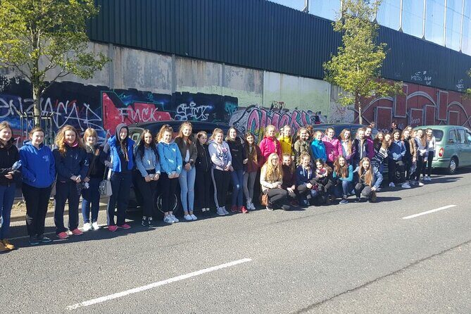 Belfast cab /taxi private 90 mins Terror and conflict- peace tour - Murals on Divis Street: Changing Messages in Public Art