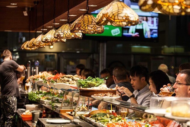 Boqueria & St Caterina Markets with Food & Tapas Small Group Tour - Sampling Local Flavors and Hidden Gems