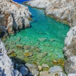 Chania: Hiking through History and Hidden Gems at Katholiko Bay - Exploring Hidden Caves and Rock Formations