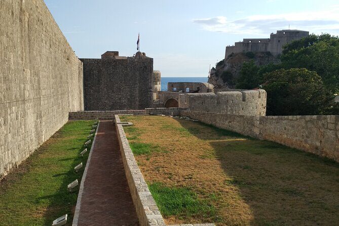 Dubrovnik Walls: Secret Tunnels of Mineta Tower & Fort Bokar - How the Tour Starts: Mineta Fortress and the Hidden Basketball Court