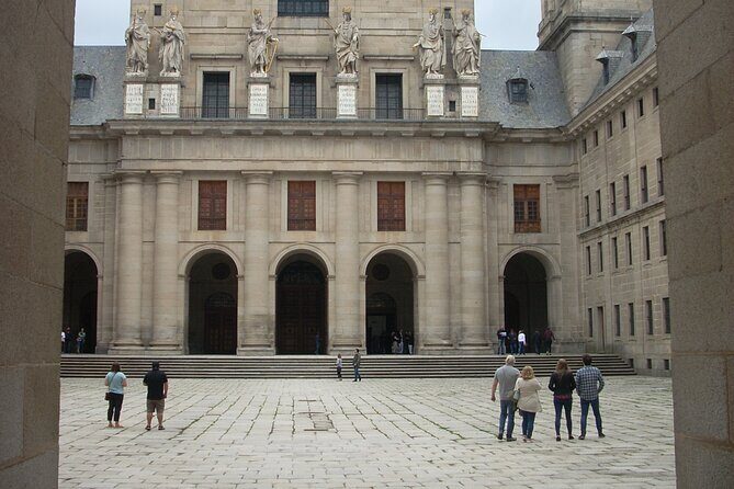 El Escorial and Valley of the Fallen Half Day Trip from Madrid - Meeting Point and Transportation