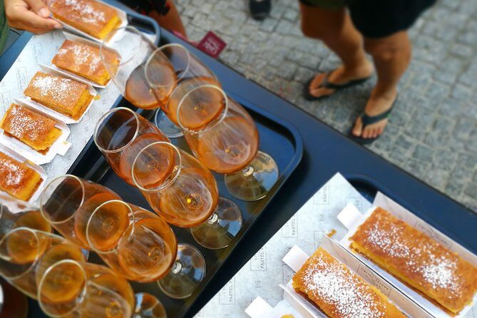 Lisbon Small-Group Food Tour with 18 Tastings in Alfama District - Exploring the Alfama District: A Walkthrough