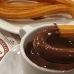 Madrid Bike Tour with Churros and Wine, Ham, and Cheese Upgrade - Discovering Madrid’s Landmarks and Hidden Gems