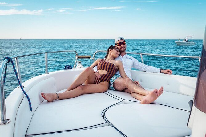 PRIVATE boat tour from Monopoli 3 or 5 with Skipper and Aperitif - The Experience Onboard