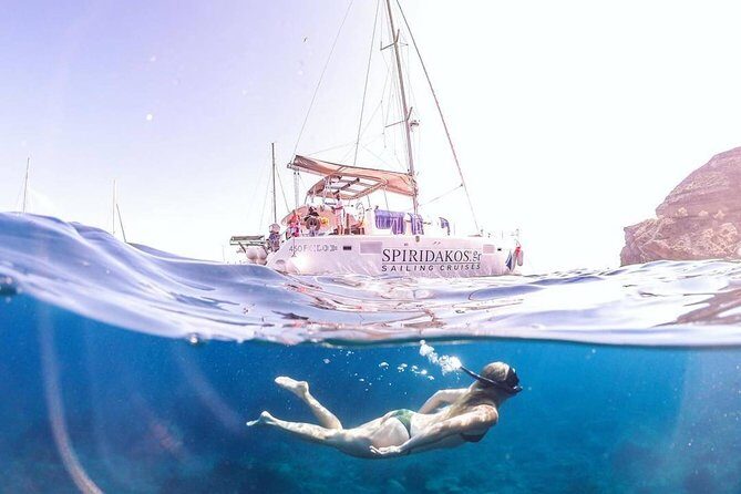 Santorini Classic Catamaran Cruise with BBQ, Drinks and Transfers - The Crew and Atmosphere