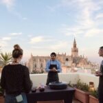 Sevilla: Panoramic Highlights Rooftop Tour & Paella Cooking Class - The Setting and Atmosphere