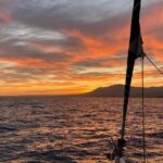 Sunset sailing along the cliffs of Maro- Private - The Cost and Value