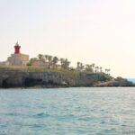 Tour of the island of Ortigia and exploration of sea caves with baths. - The Guide and Group Size