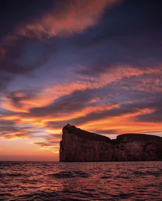 Alghero: boat tour with aperitif at sunset Porto Conte - What Makes This Tour Stand Out?