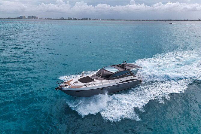 All Inclusive Cancun: Coast & Fun 4 hrs Luxury Yacht 50' Cranchi - The Highlights: Sailing, Snorkeling, and Gourmet Eats