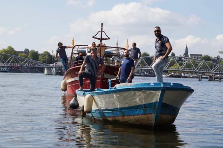 Amsterdam: Canal Cruise on a Wooden Refugee Boat - The Power of Personal Stories