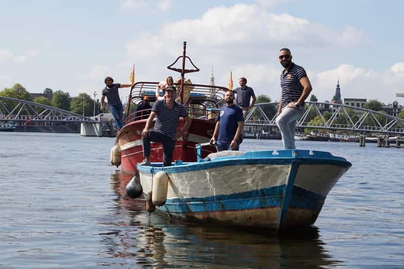 Amsterdam: Canal Cruise on a Wooden Refugee Boat - The Power of Personal Stories
