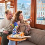 Amsterdam: Canal Cruise with Bubbles & Bites - The Experience of the Guide and Commentary