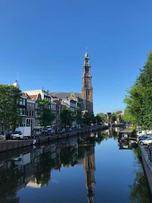 Amsterdam: Hidden Gems and Highlights in DE/EN/IT - Exploring the Hidden Courtyards and Charming Streets