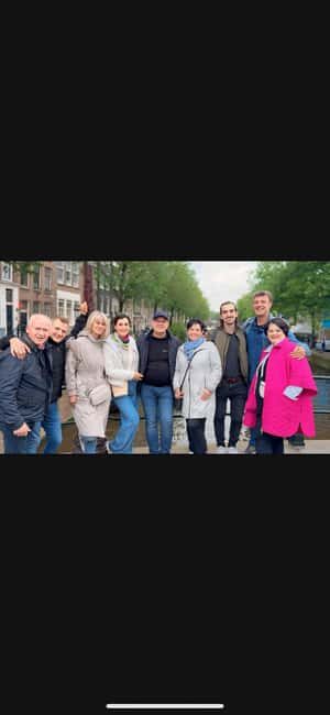 Amsterdam: Red light district tour in German - Photo Opportunities and Stops