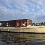 Amsterdam: Zaanse Schans Private Boat Tour with Guide - The Sum Up