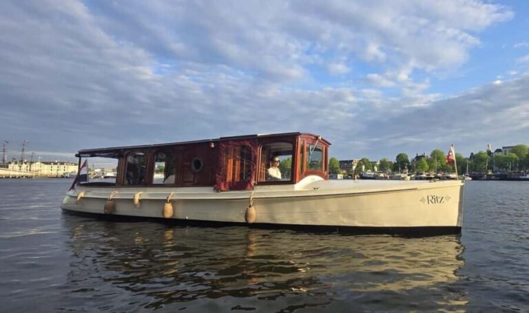 Amsterdam: Zaanse Schans Private Boat Tour with Guide - The Sum Up