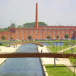 Aveiro Essential: Boat, Walking Tour, Sweets & Ribbons - Walking Through Aveiro’s Beira Mar Neighborhood