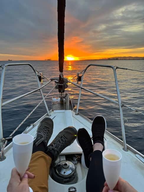 Barcelona: Sunset Sailboat Cruise with Open Bar and Snacks - Why People Love This Cruise