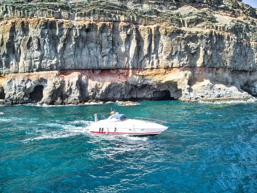 Boat ride from Puerto de Mogán along the coastline to Güigüi - Exploring Güigüi Beach and Secret Coves