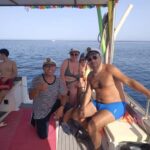 Boat tour from Terrasini: caves, snorkeling, and traditional tasting - The Experience Onboard