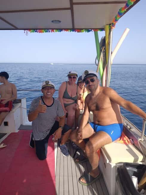 Boat tour from Terrasini: caves, snorkeling, and traditional tasting - The Experience Onboard