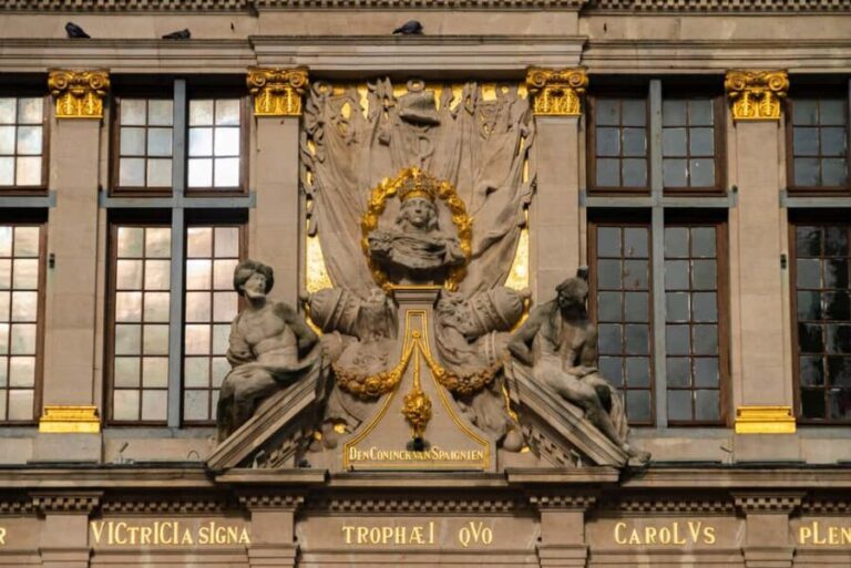 Brussels: city walking tour with a local Economic Historian - The Tintin Mural and Manneken Pis