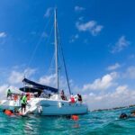 Cancun Sailing Catamaran Islas Mujeres With Luxury Beach Club - Weighing the Pros and Cons