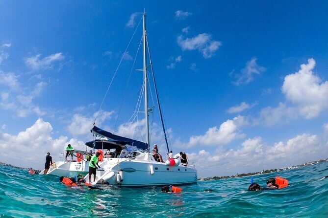 Cancun Sailing Catamaran Islas Mujeres With Luxury Beach Club - Weighing the Pros and Cons
