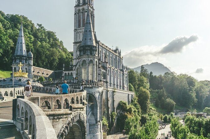 Experience Lourdes: Guided Tour & Convenient Transport - Who Should Consider This Tour?