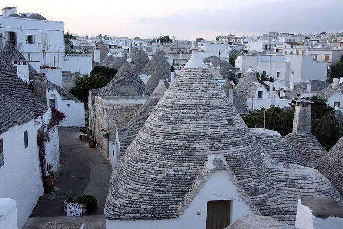 From Bari: Polignano a mare & Alberobello half day trip - Polignano a Mare: A Cliffside Charm
