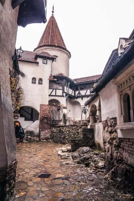 From Bucharest: Dracula's Castle and Braov Full Day Trip - Visiting Bran Castle: The Legend Meets Reality