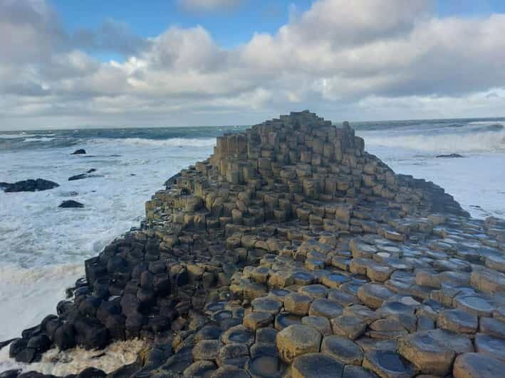 From Dublin: Giants Causeway Private Tour - Dunluce Castle: Medieval Drama and Movie Magic