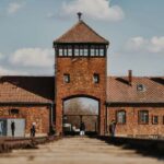 From Krakow: Auschwitz-Birkenau Guided Tour with Transport - Auschwitz I: The First Stop