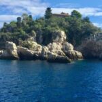 Giardini-Naxos: Sunset Boat Tour with Aperitif and Dolphins - The Experience in Detail
