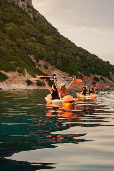 Golfo Aranci: traditional or transparent kayaks, dolphins, and aperitifs - The Kayak Choices and Why They Matter