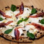 Gourmet Pizza Experience with Drinks and Dessert in Lecce - The Atmosphere and Host Experience