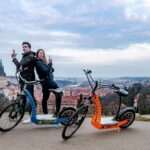 Grand City Tour of Prague on Cruiser e-Bikes or e-Scooters - Key Points