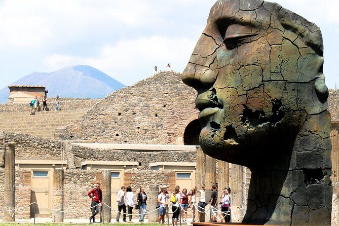 Guided Tour of Pompeii and Herculaneum with Lunch and Ticket - The Pompeii Adventure: Walking Through a Preserved Ancient Roman City