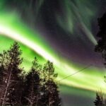 Inari: Northern Lights Hunt Snowmobile Safari - The Allure of Snowmobiling in the Arctic Wilderness