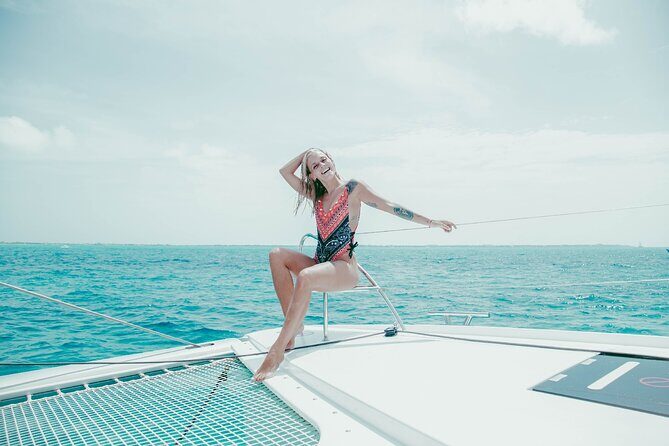 Isla Mujeres Cruise with Beach Club, Snorkel, Lunch and Open Bar - Snorkeling in the Vibrant Reefs