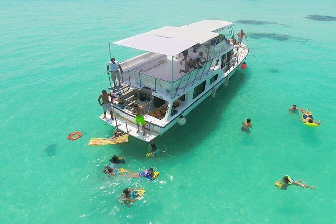 Isla Mujeres Full Day Tour on Yacht with Snorkel and Buffet - Floating Buffet & Beach Time: A Unique Dining Experience