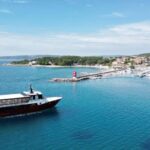 Krk: Boat Trip to Rab & Pag with Sightseeing & Swimming - Exploring the Island of Rab