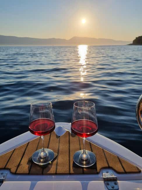 Krk: Sunset Boat Tour with wine, high chance of dolphins - What Makes This Tour Special?