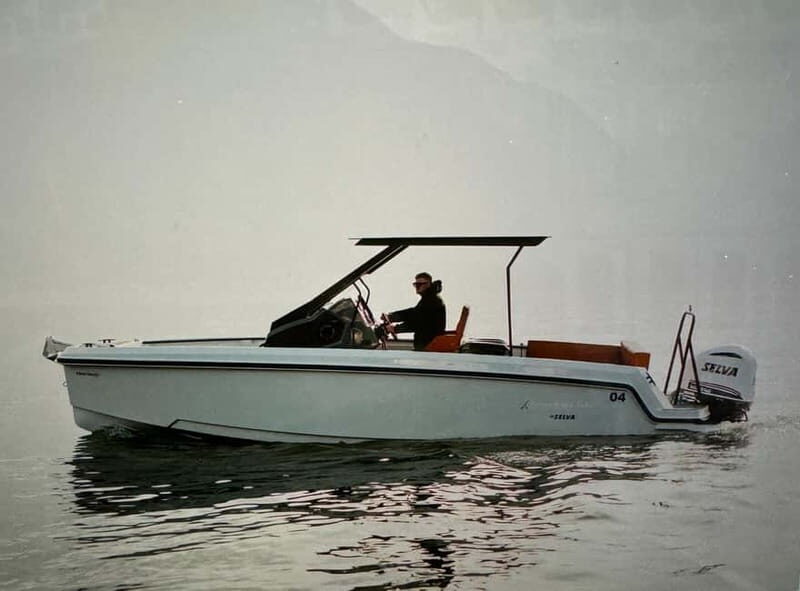 Lake Como Boat tour share- prosecco and winter cover - The Itinerary: What to Expect