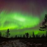 Lapland: Aurora Hunting by Minivan with Guide and Transport - Key Points