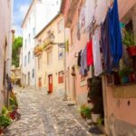 Lisbon: City Audio Guide with 24-Hour Transportation Pass - Exploring Lisbon’s Neighborhoods