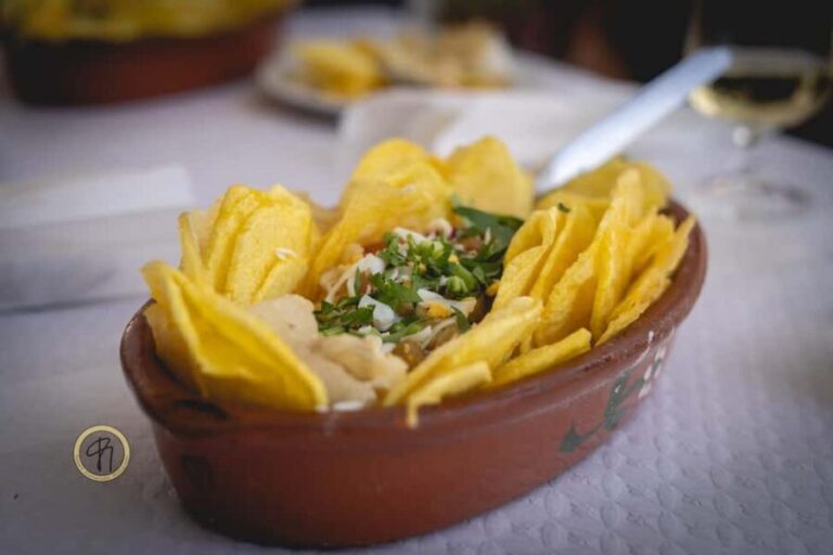 Lisbon: Portuguese Cuisine Food Tour with 17 Tastings - Discovering Mouraria & Alfama: Neighborhoods with Soul